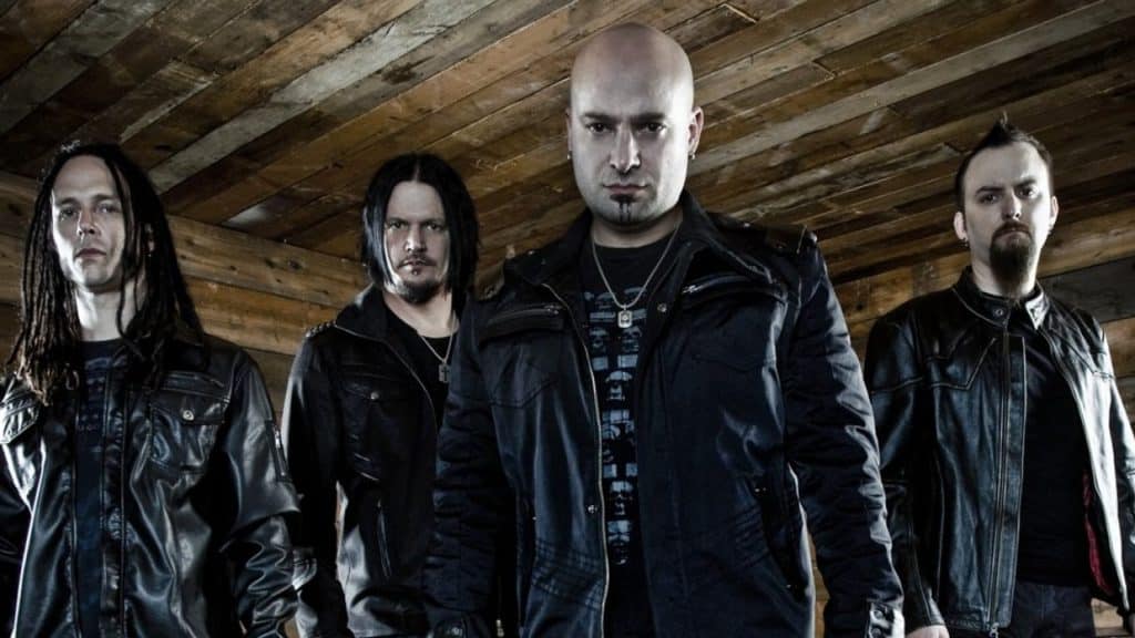 Disturbed: "Ni nuestro bajista sabía que estábamos grabando un disco" - A mediados de 2011, una de las bandas más activas del metal anunciaba su separación por tiempo indeterminado. Desde ahí, hubo un hermetismo total y se escondieron por completo. Cuatro años más tarde, y cuando nadie se lo esperaba, Disturbed confirmó su regreso.... con un disco bajo el brazo. disturbed 1